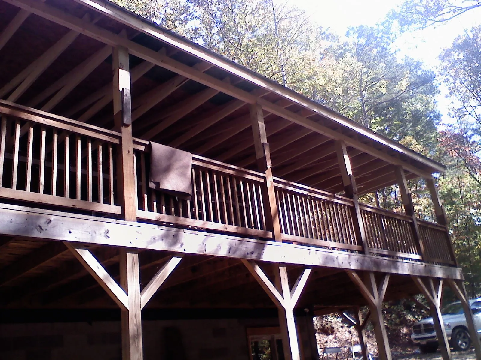 Timber framing under a new elevated porch and deck — Roof Leak Repair in Wrightwood by Roofing Brothers